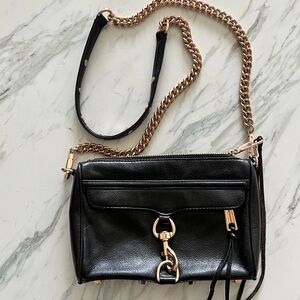 Rebecca Minkoff Mini M.A.C. in black leather and rose gold hardware.